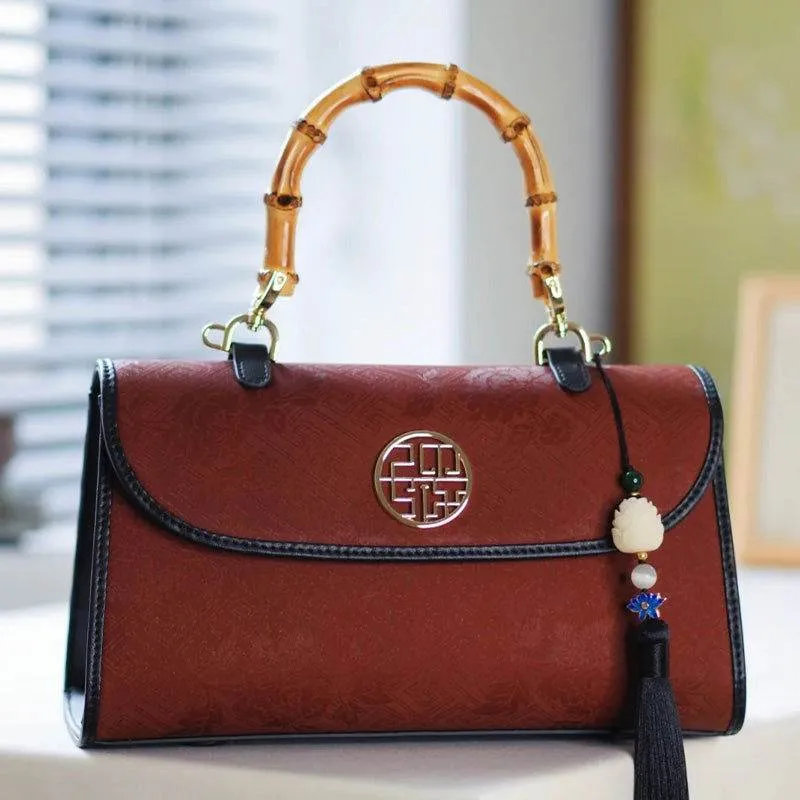 Xiangyunsha Silk Bamboo Handle Brwon Handbag